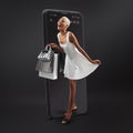 Black Friday shopping online , Stunning, smiling, happy black woman in white outfit with shopper bags, comes out from the screen Royalty Free Stock Photo