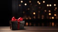 Black Friday Surprise: Stylish Gift Box with Red Ribbon on Dark Table