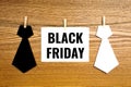 Black friday, text on paper card with neck monochrome ties