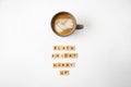Black friday text on wooden blocks and cup of coffee. top view Royalty Free Stock Photo