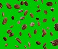 Black fried coffee beans falling down, green screen, 3d rendering Royalty Free Stock Photo