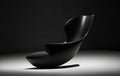 Black, futuristic armchair on a dark background. Abstraction