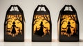 Black Gable Boxes with Orange Light and Witch Silhouette Cutouts Royalty Free Stock Photo