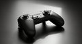 Black Game Controller on Dark Surface with Dramatic Lighting Royalty Free Stock Photo