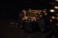 Black gamepad on a dark background Royalty Free Stock Photo