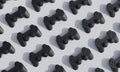 Black gamepads pattern set on white background with shadows. Video games concept, 3d rendering