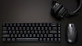Black gaming computer keyboard, headphones and computer mouse on a dark background. Wireless technology and gadgets. Copy space Royalty Free Stock Photo