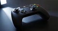 Black Gaming Controller with Colorful Buttons on Dark Surface Royalty Free Stock Photo