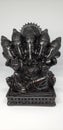 Black Ganesha statue with white background