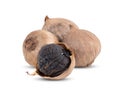 Black garlic bulbs on white background Royalty Free Stock Photo