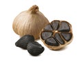 Black garlic cloves isolated on white background Royalty Free Stock Photo