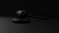A black gavel resting on a smooth surface, symbolizing authority in legal contexts Royalty Free Stock Photo