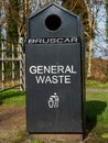 Black general waste metal bin in a park Royalty Free Stock Photo