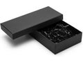 Black gift box with confetti isolated on white background Royalty Free Stock Photo