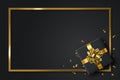 Black gift box and gold bow ribbons with confetti on dark texture background.