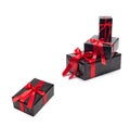 Black gift box with red satin ribbon and bow Royalty Free Stock Photo