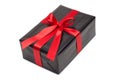 Black gift box with red satin ribbon and bow