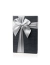 Black gift box with silver ribbon bow isolated on white background Royalty Free Stock Photo