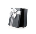 Black gift box with silver ribbon bow isolated on white background Royalty Free Stock Photo