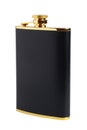 Black and gilt hipflask for alcoholic drink Royalty Free Stock Photo