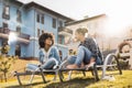 Friendly conversation of two girls of different races outdoor Royalty Free Stock Photo