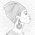 Black girl in a turban in profile with an earring.Coloring book antistress for children and adults.