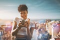 Black girl with vintage film camera Royalty Free Stock Photo