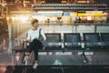 Black girl is waiting her airplane in airport terminal Royalty Free Stock Photo