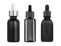 Black glass serum dropper bottle. Isolated pipette container Royalty Free Stock Photo