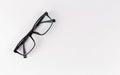 Black glasses on a white background close up, isolated Royalty Free Stock Photo