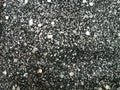 Black glitter sparkle background. Black friday shiny pattern with sequins. Christmas glamour luxury black christmas and glitter Royalty Free Stock Photo