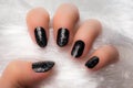 Black glittered nails