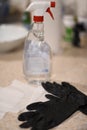Black gloves and desinfectant spray Royalty Free Stock Photo