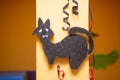 Black goat decoration in kids club on the wall during Halloween party