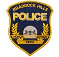 A black and gold BRADDOCK HILLS POLICE shoulder patch on a white background