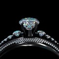 Black gold coating engagement ring with diamond gem Royalty Free Stock Photo