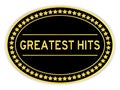 Black and gold oval sticker with word greatest hits on white background