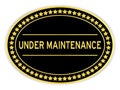 Black and gold oval sticker with word under maintenance on white background