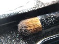 black gold eyeshadow brush Royalty Free Stock Photo