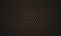 Black and gold hexagon carbon fiber texture. Golden honeycomb metal texture steel background.