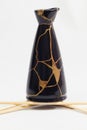 Black Gold Kintsugi Sake Royalty Free Stock Photo