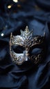 A black and gold masquerade mask on a black cloth, AI Royalty Free Stock Photo