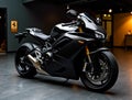 A black motorcycle parked inside of a building Royalty Free Stock Photo