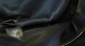 Black and gold silk fabric texture background Royalty Free Stock Photo