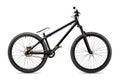 Black gold slopestyle dirt jump bike Royalty Free Stock Photo