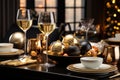 A black and gold-themed brunch table with minimalistic tableware, champagne flutes, and holiday treats, perfect for a Royalty Free Stock Photo