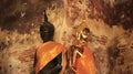 Black And Golden Buddha Statue With Old Wall Royalty Free Stock Photo