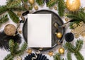 Black and golden Christmas Table setting with ornaments and fir tree branches. Menu card Mockup Royalty Free Stock Photo