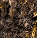 Black, golden rock background - stone texture Royalty Free Stock Photo