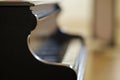 Black grand piano with blurry background Royalty Free Stock Photo